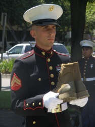 Marine with boots and dog tags