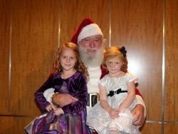 Santa with two young ladies